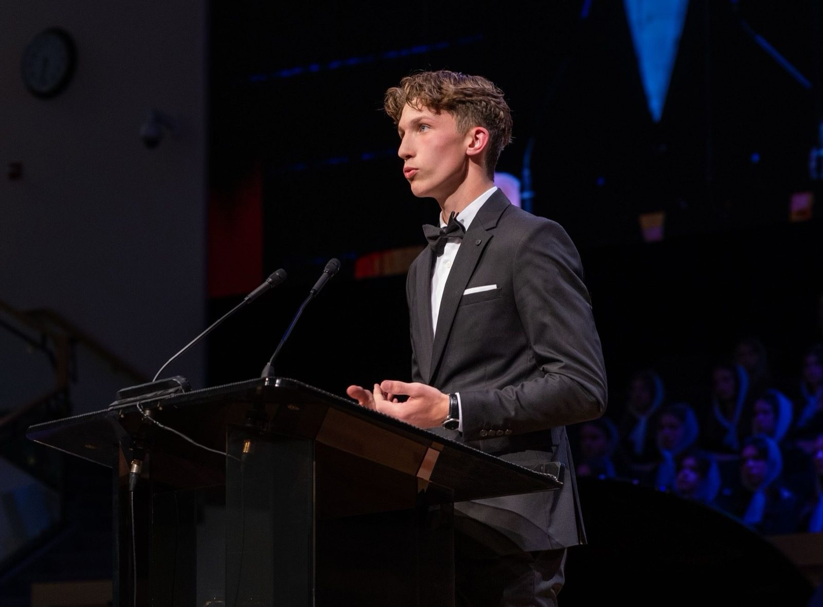 Erik Otroda, founder of APEX Marketing, speaking on stage